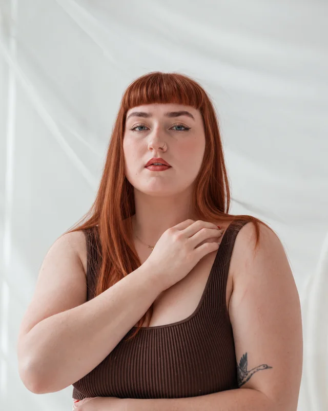 Brown hair changed to copper red on the same stock portrait